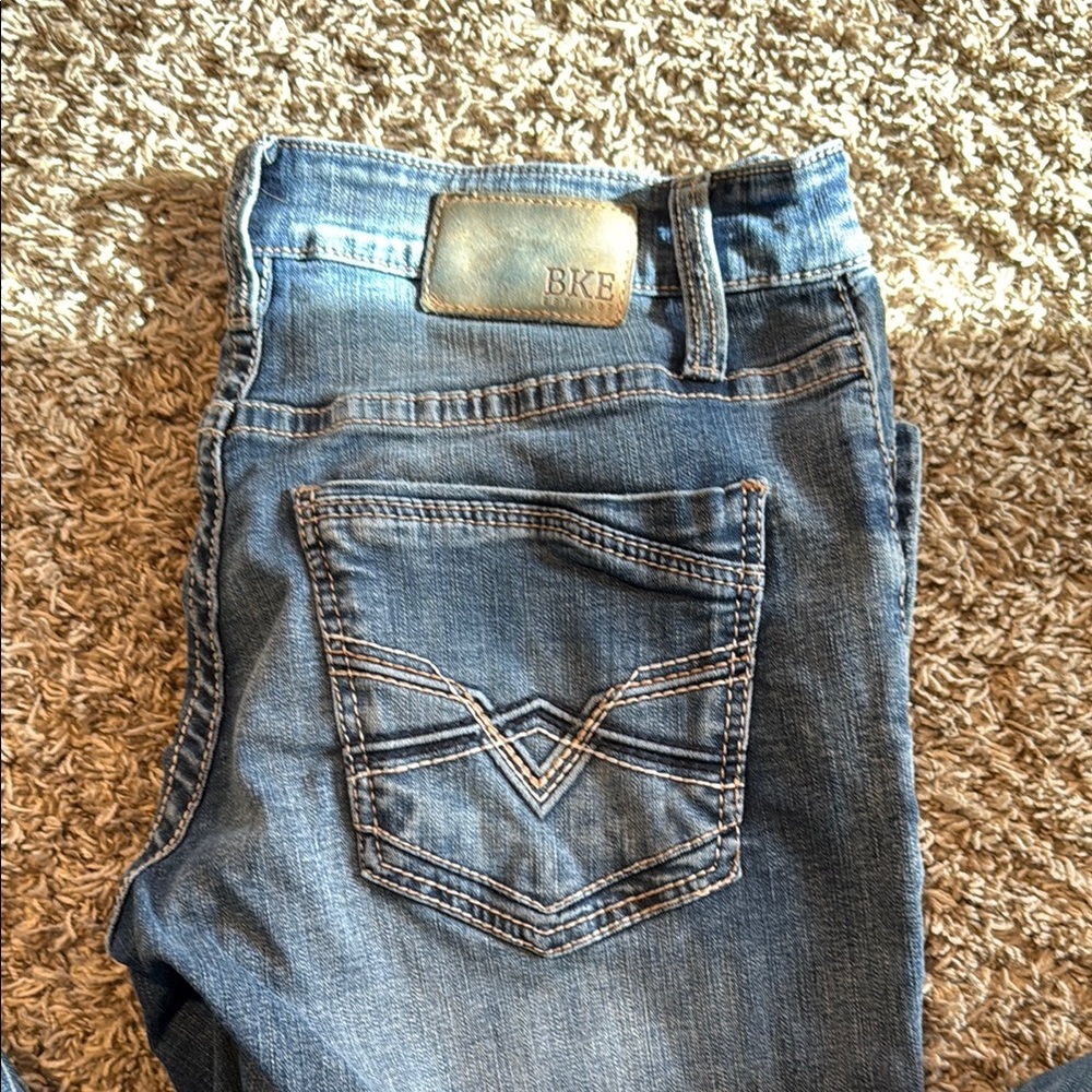 BKE Blue Bootcut Jeans with Distressed Look